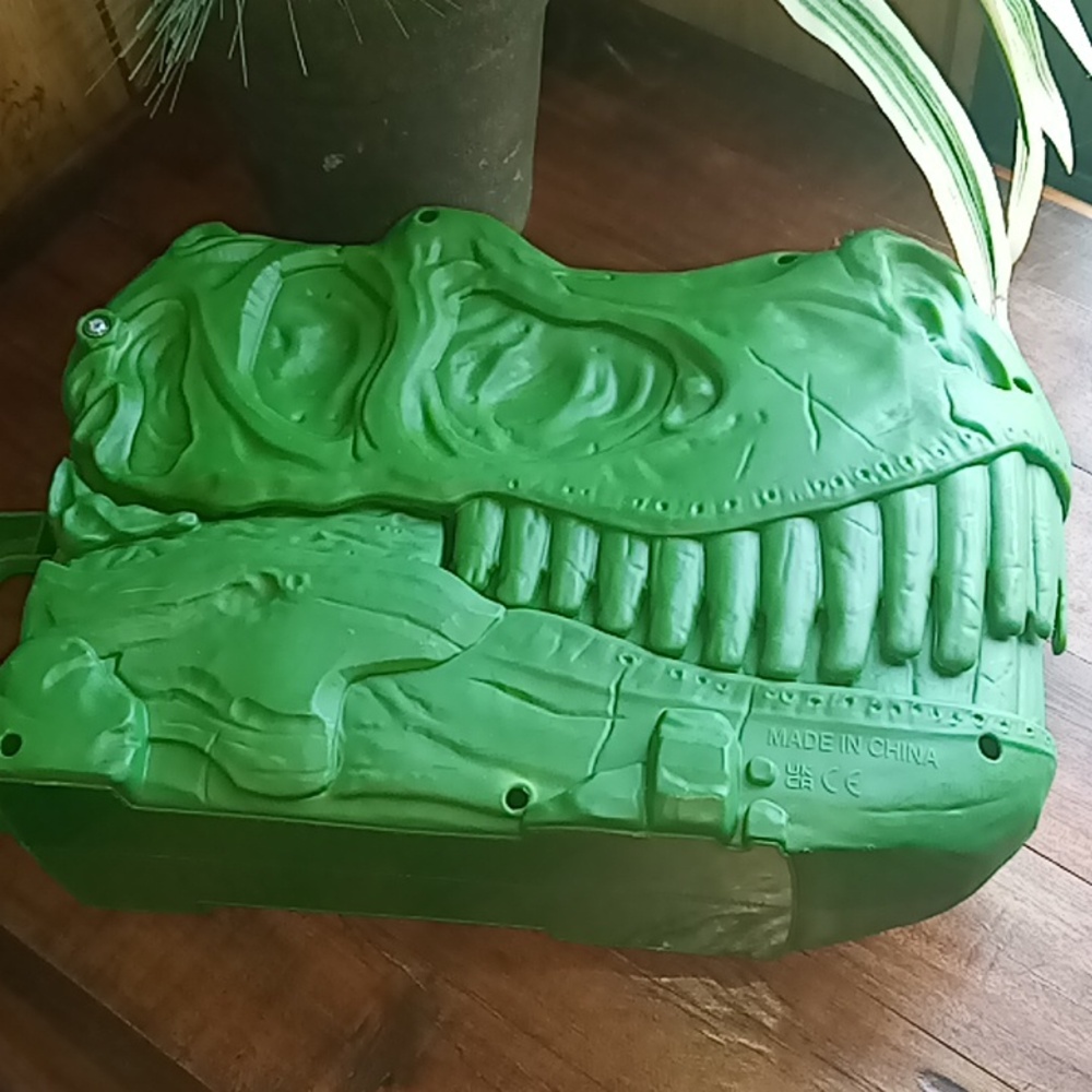 T-Rex green dinosaur toy holder